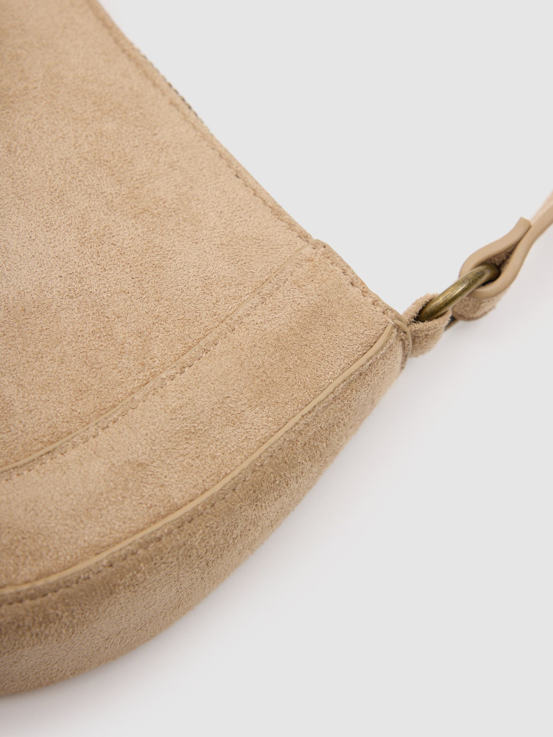 Asymmetric faux leather shoulder bag taupe front view