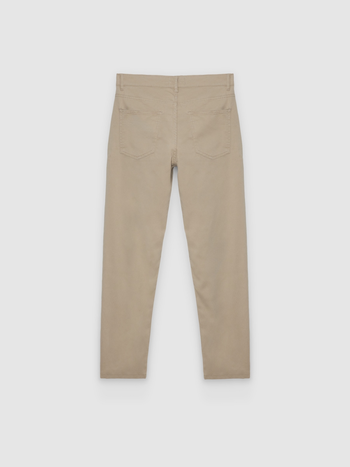 Black high-waisted slim jeans beige back view