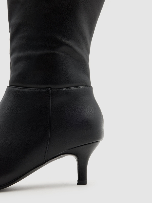 High heel boots black detail view