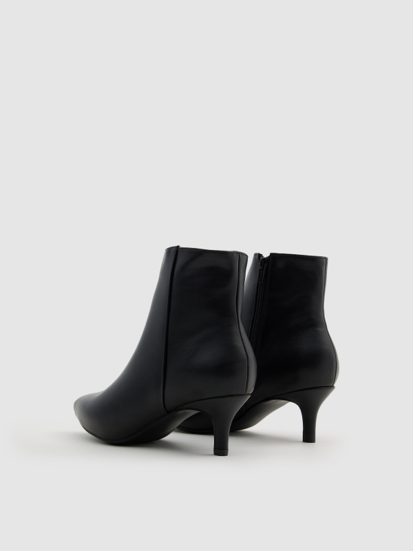 Bootie with toe and heel black 45º back view