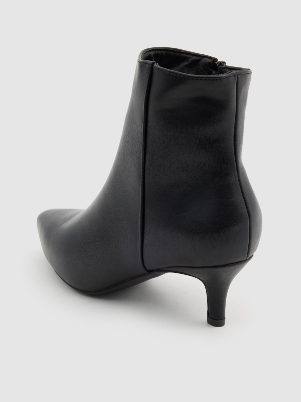 Bootie with toe and heel black detail view