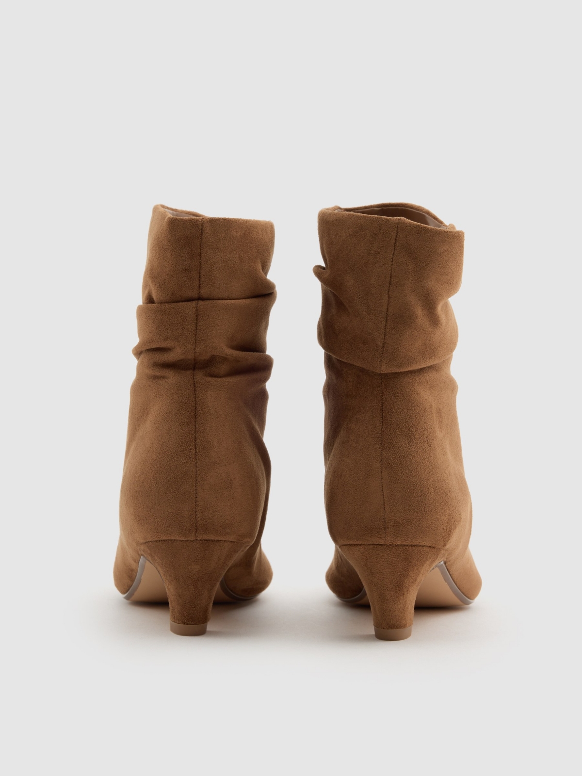 Low heel bootie with leather effect camel zenithal view