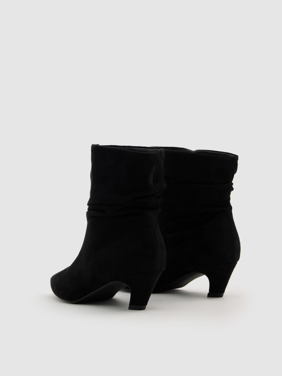 Bootie with mid heel leather effect black 45º back view