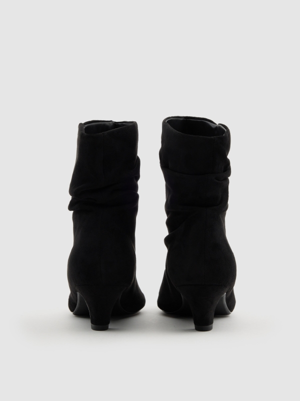 Bootie with mid heel leather effect black zenithal view