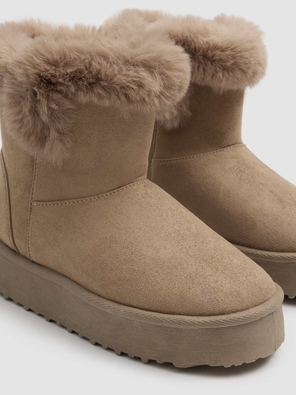 Botins plataforma pelo areia vista detalhe