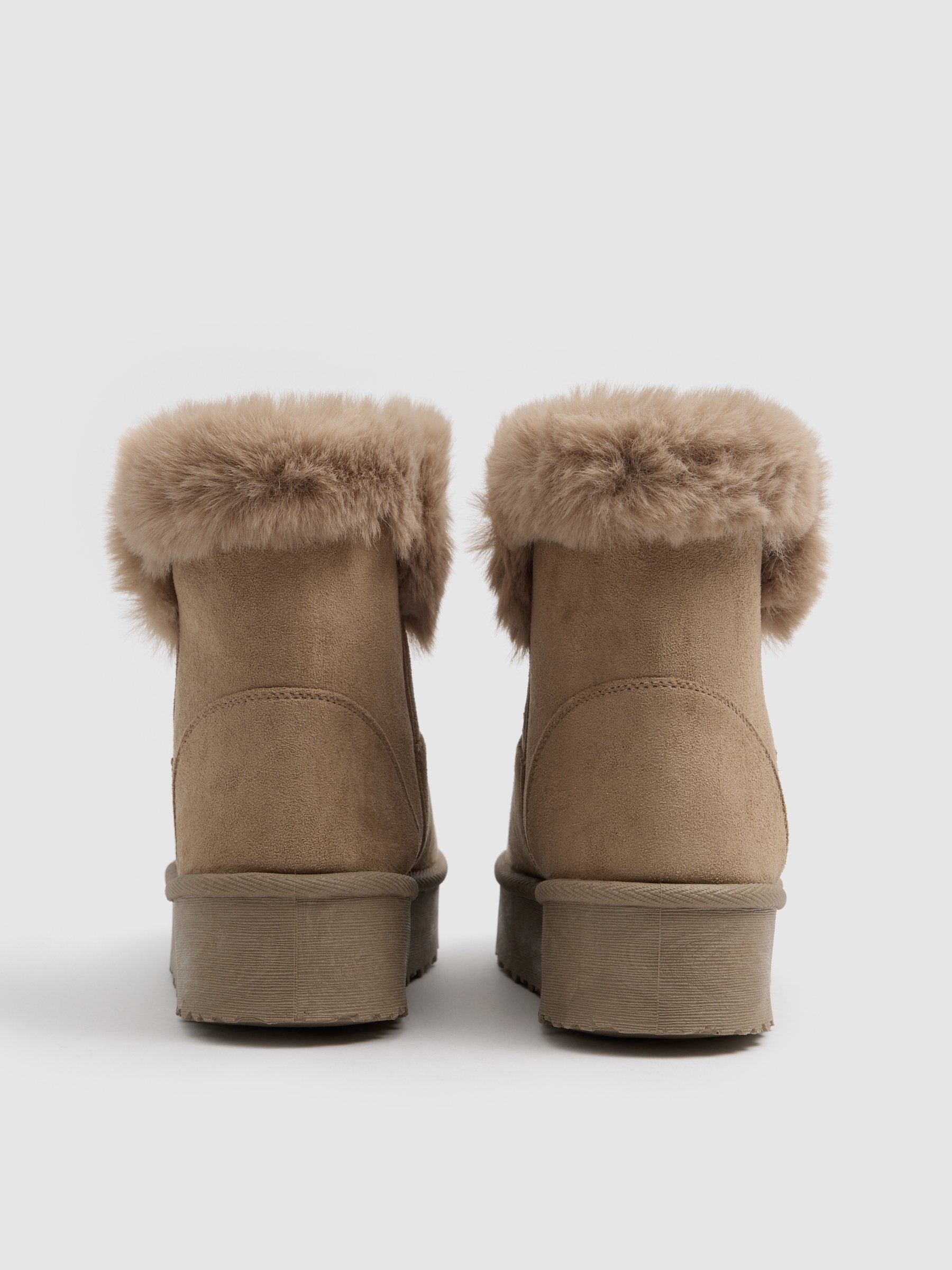 Botins plataforma pelo areia