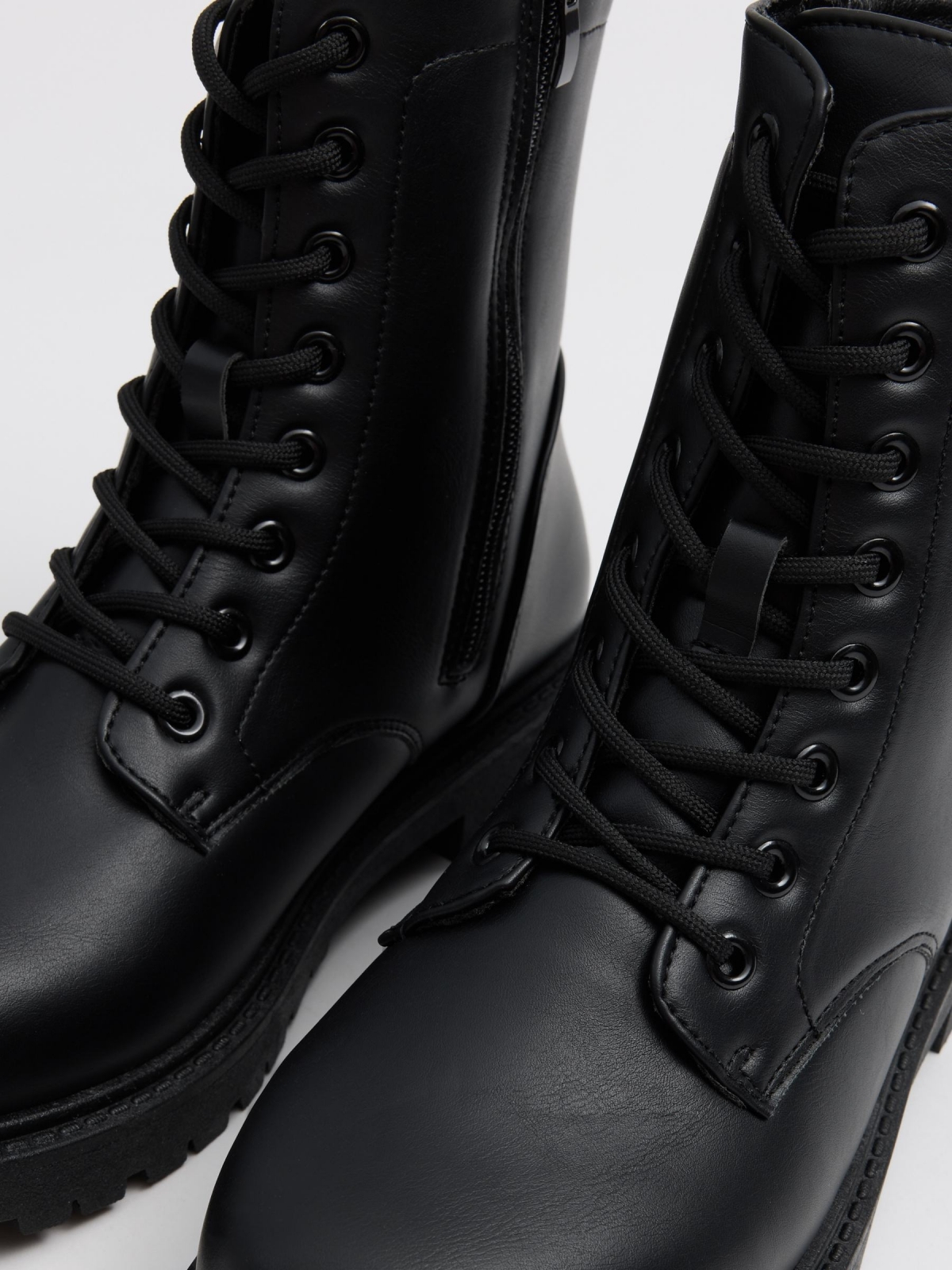 Flat lace-up microfiber ankle boots black detail view