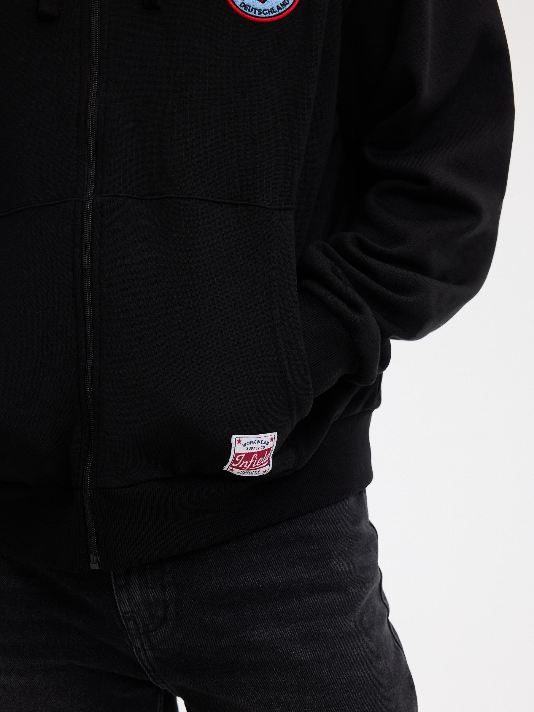 Chaqueta con capucha cremallera negro vista media frontal
