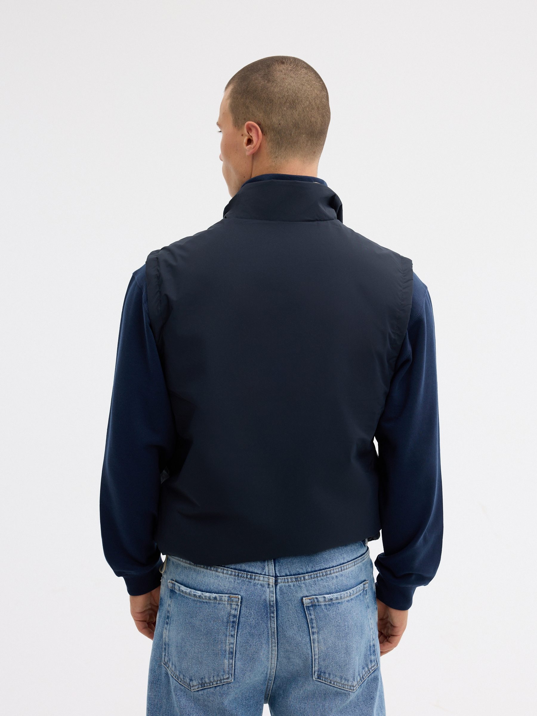 Chaleco reversible azul marino vista media frontal