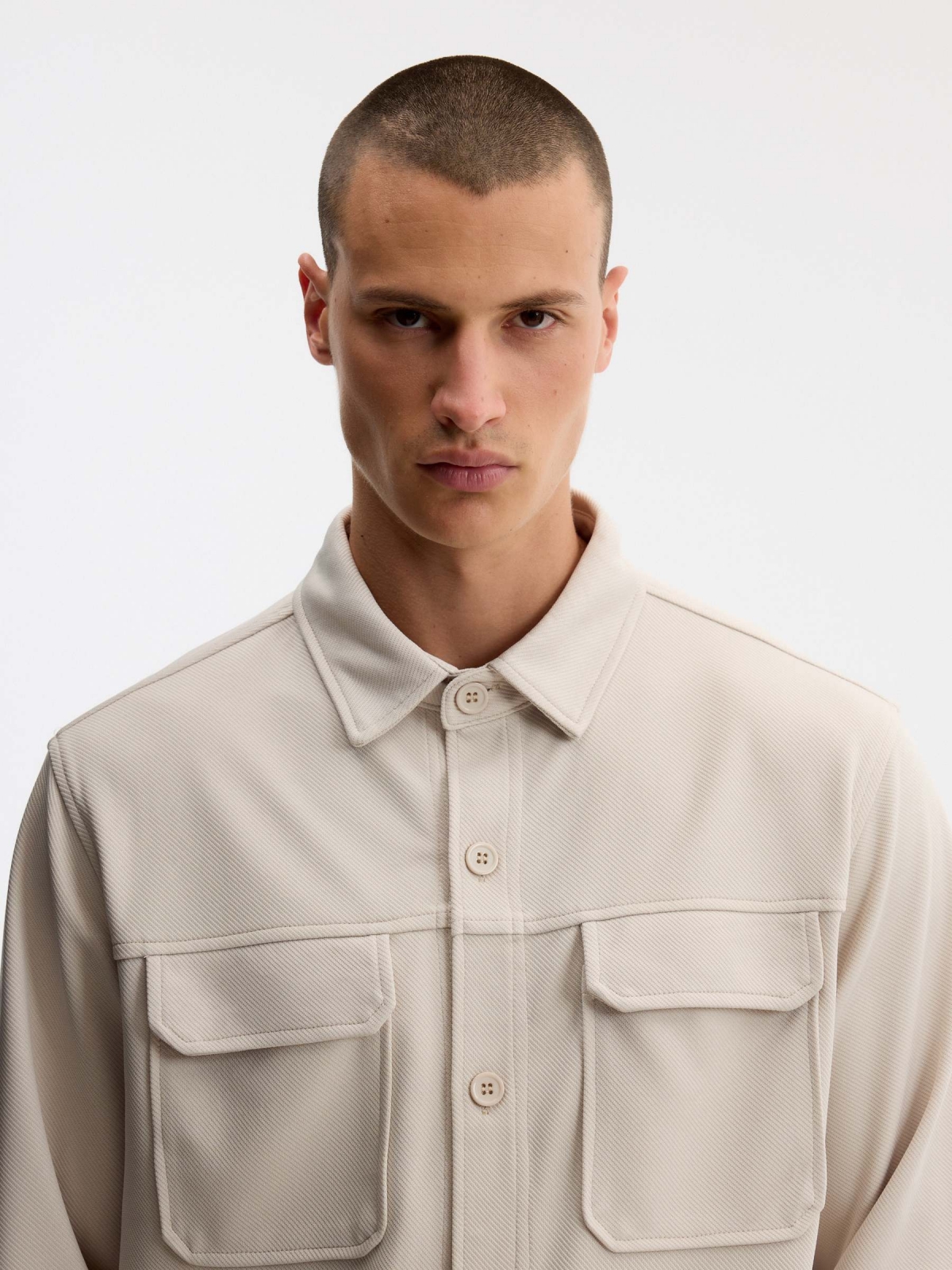 Plain cotton overshirt raw detail view