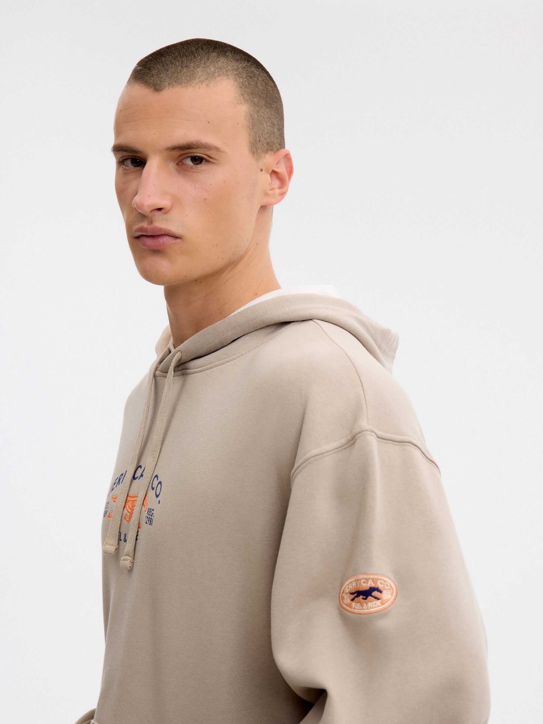 Sudadera con capucha ride beige vista media frontal