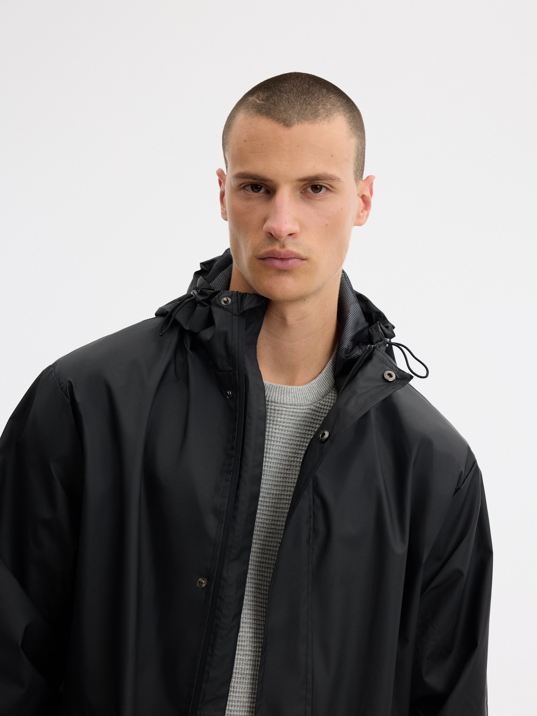 Rubberized fabric parka black middle front view