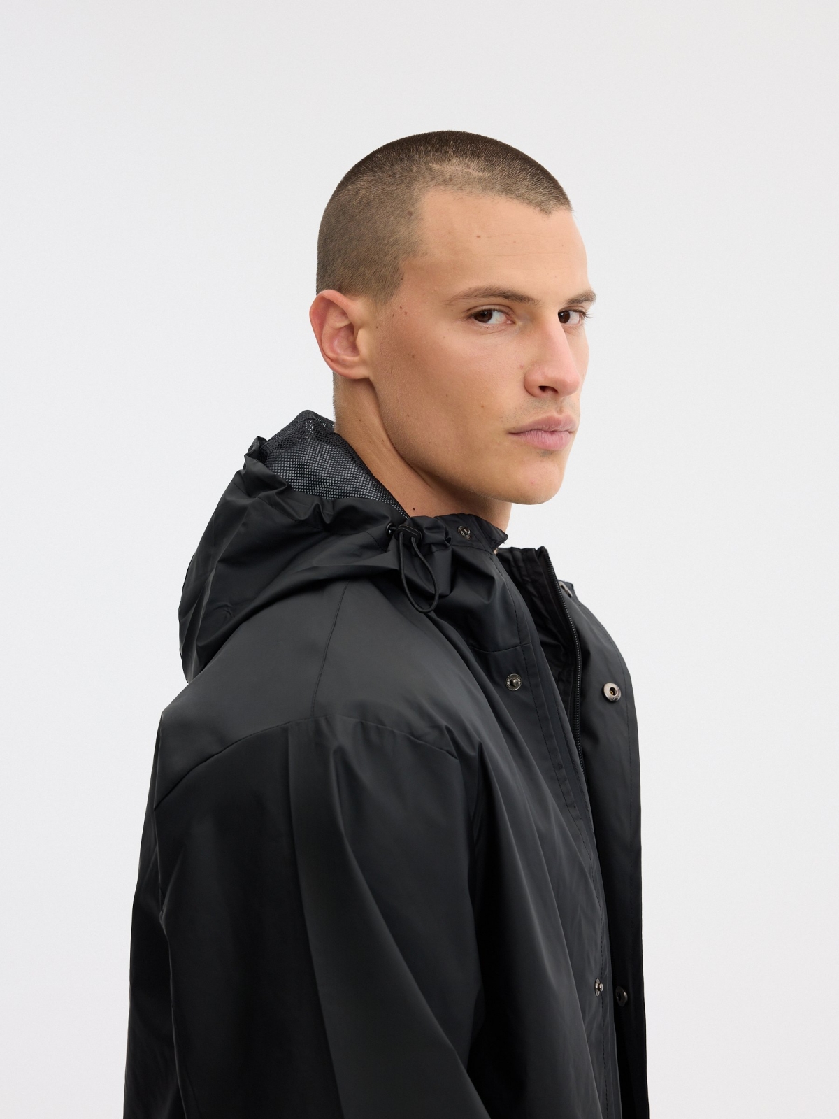 Rubberized fabric parka black detail view