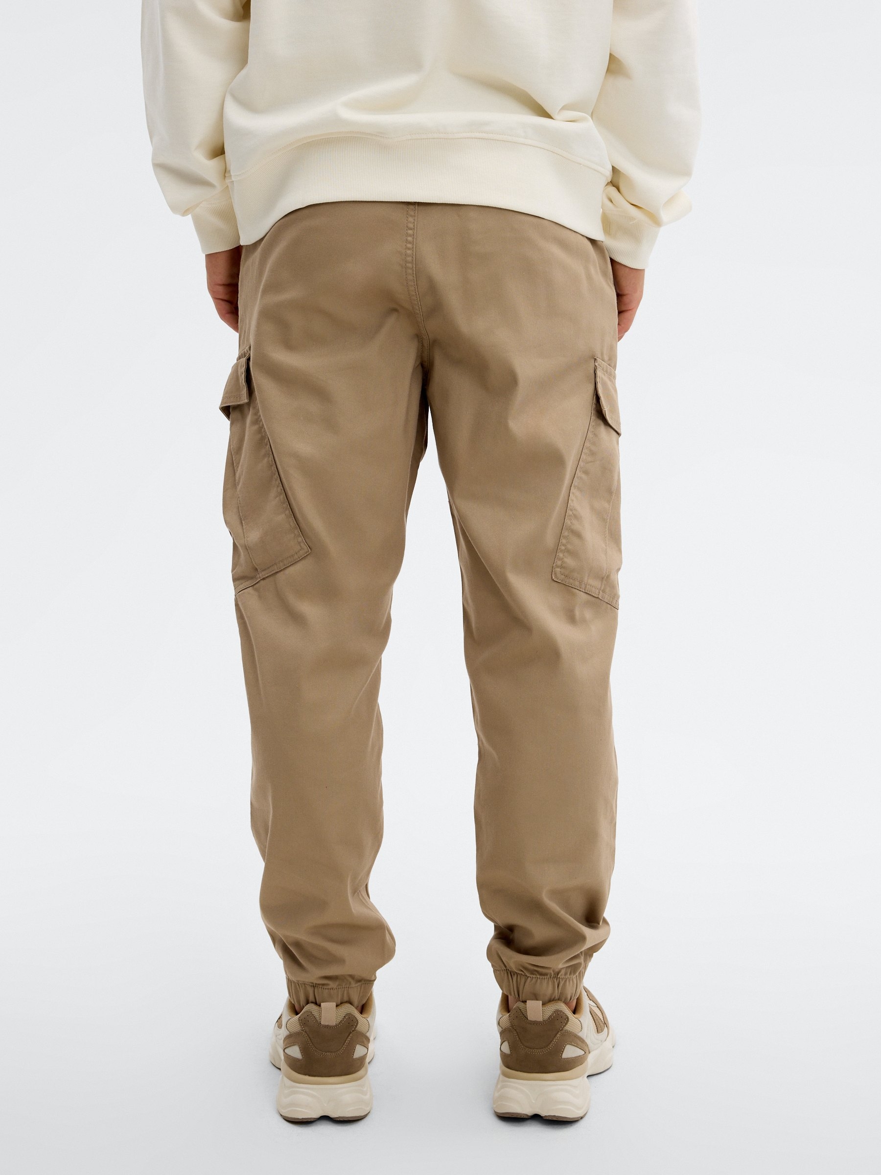 High-rise cargo jogger pants beige front view