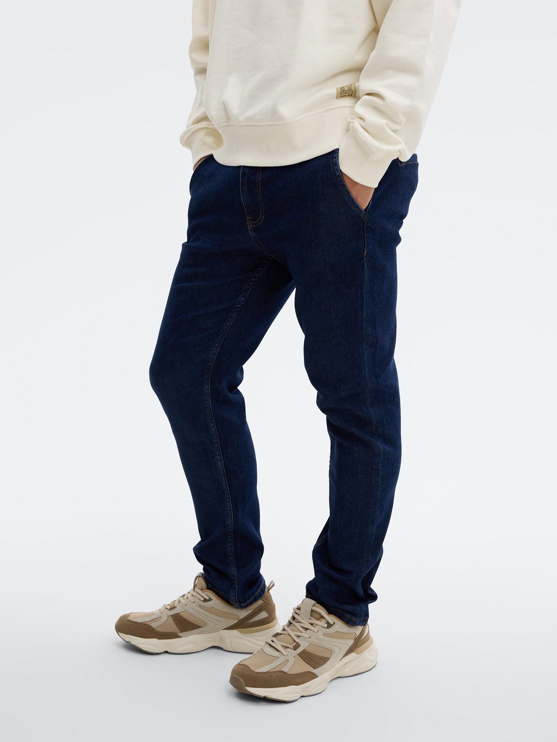 Slim denim chino pants blue front view