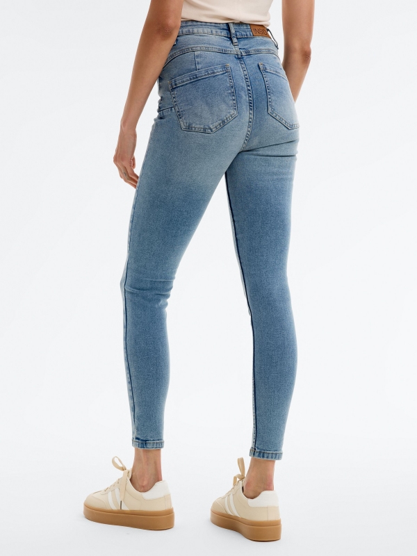 Jeans mid rise skinny push up light blue middle back view