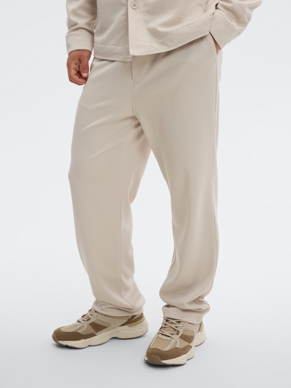 High-waisted polyester chino pants raw middle front view