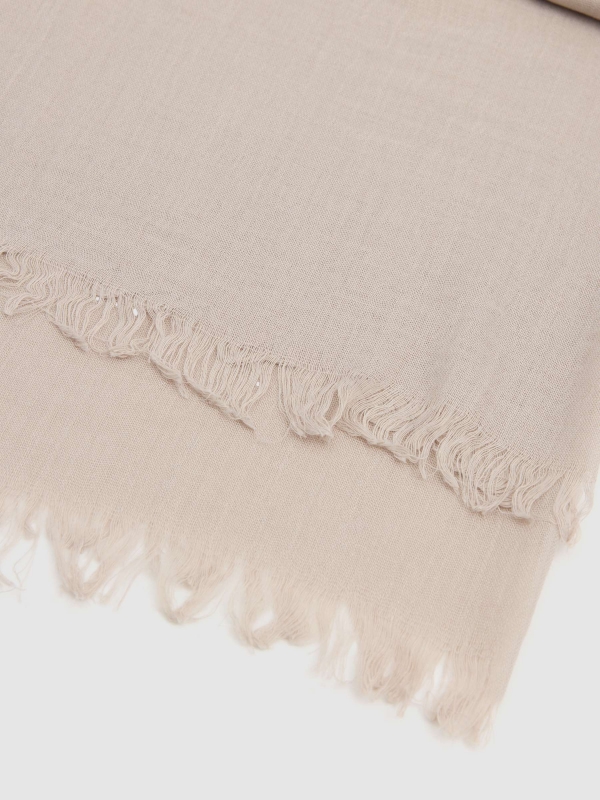Plain scarf with fringes beige rolled view