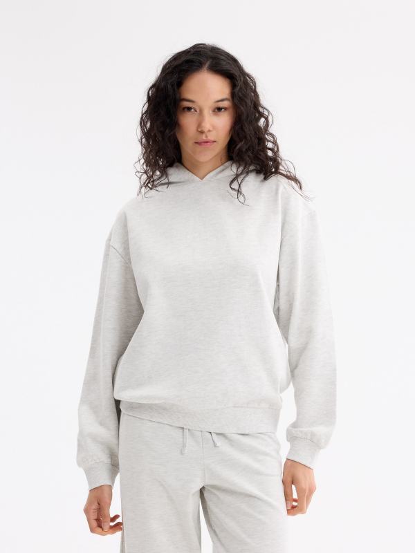 Sweatshirt com capuz soft melange claro vista meia frontal