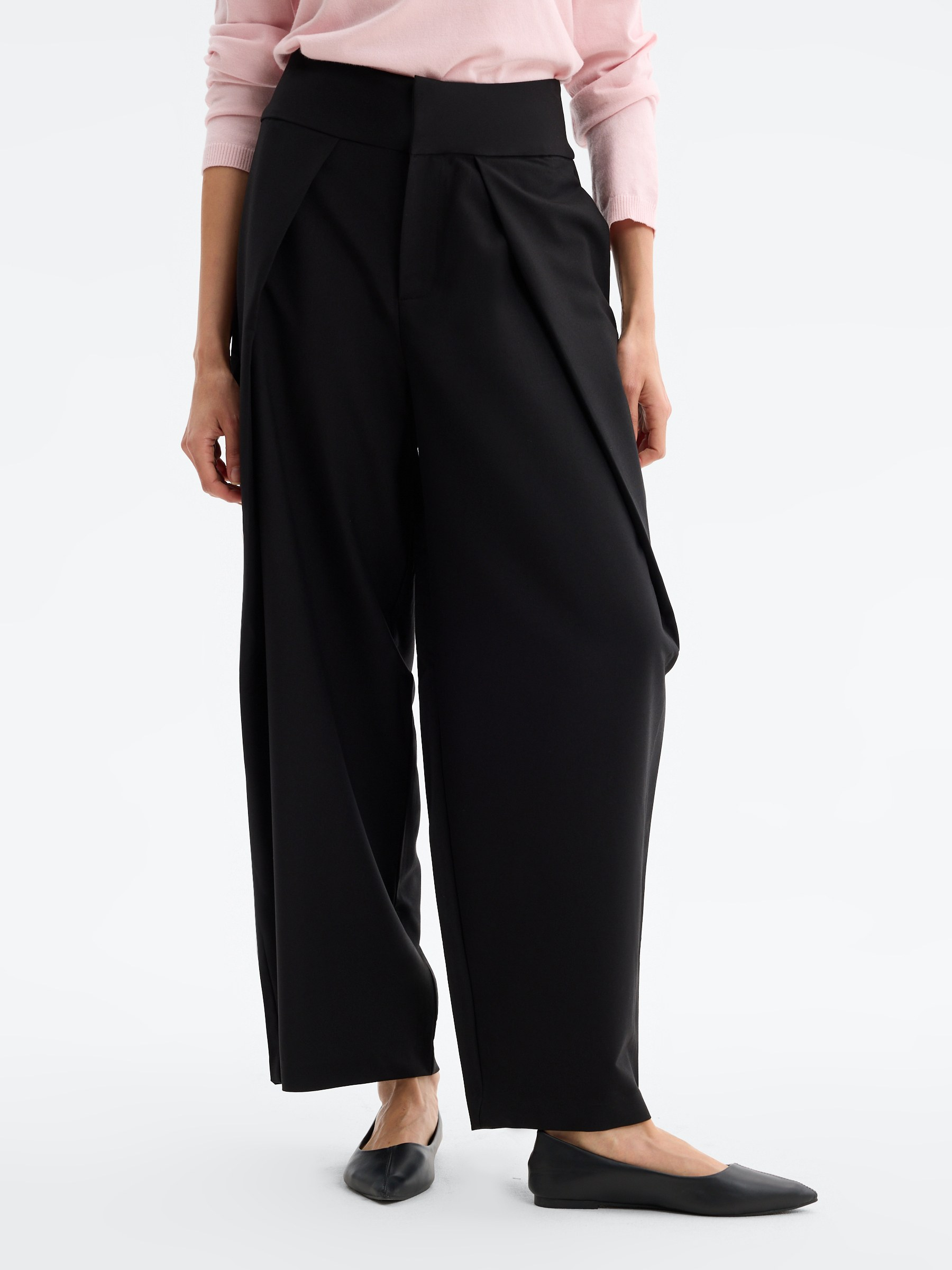 High-waisted pleated balloon pants black front view