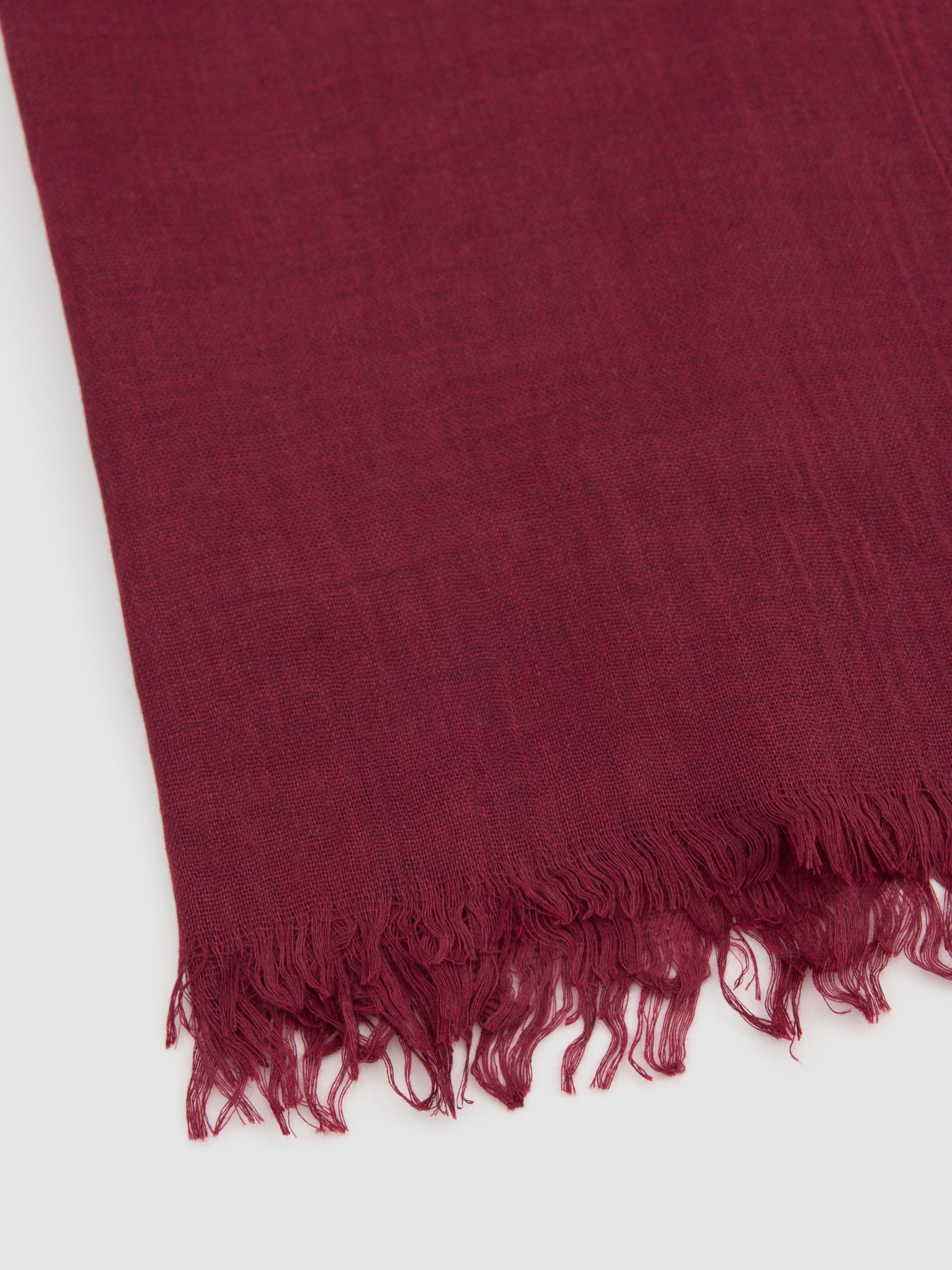 Plain scarf with fringes burgundy rolled view