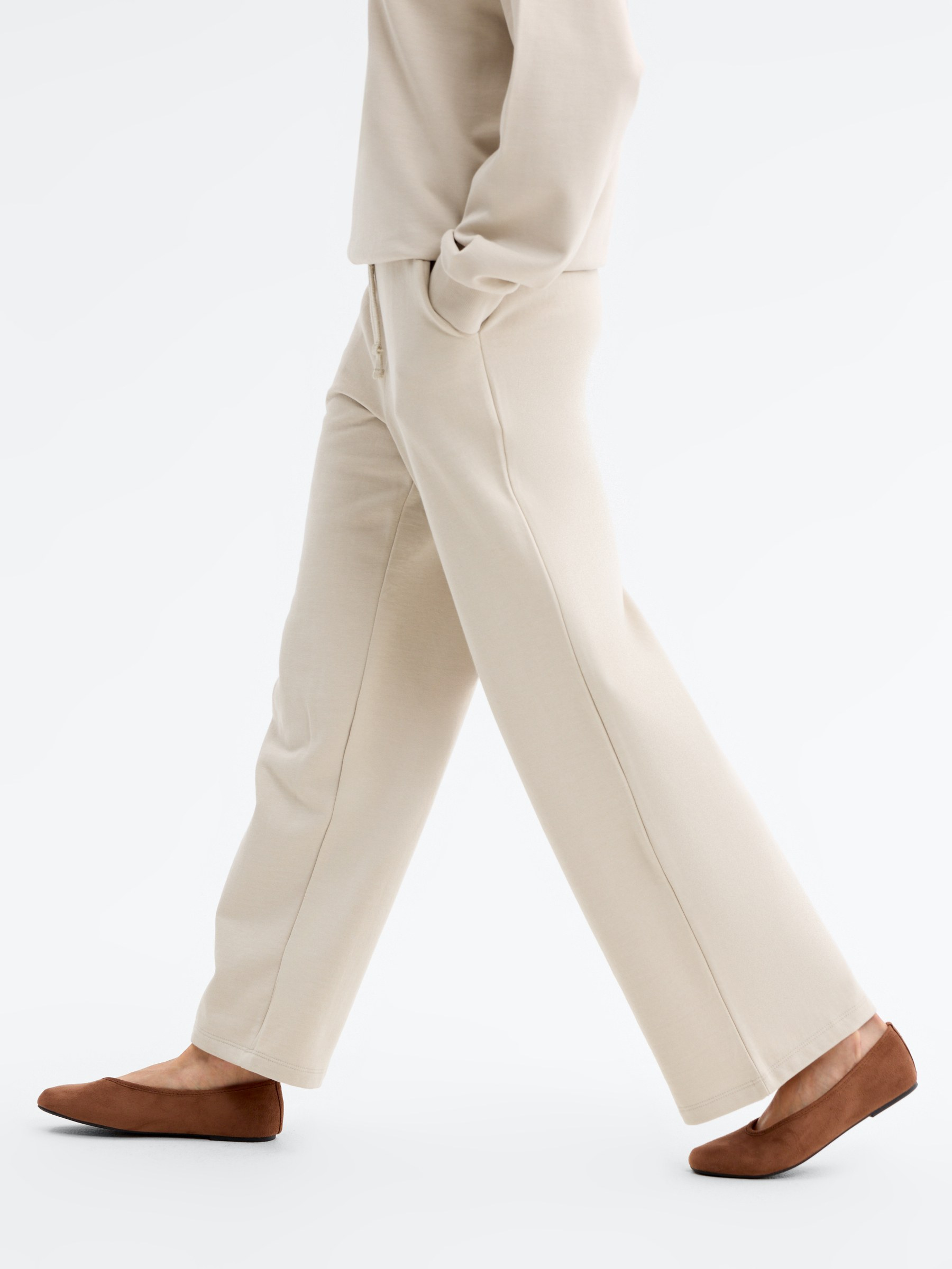 Wide-leg tracksuit bottoms raw front view