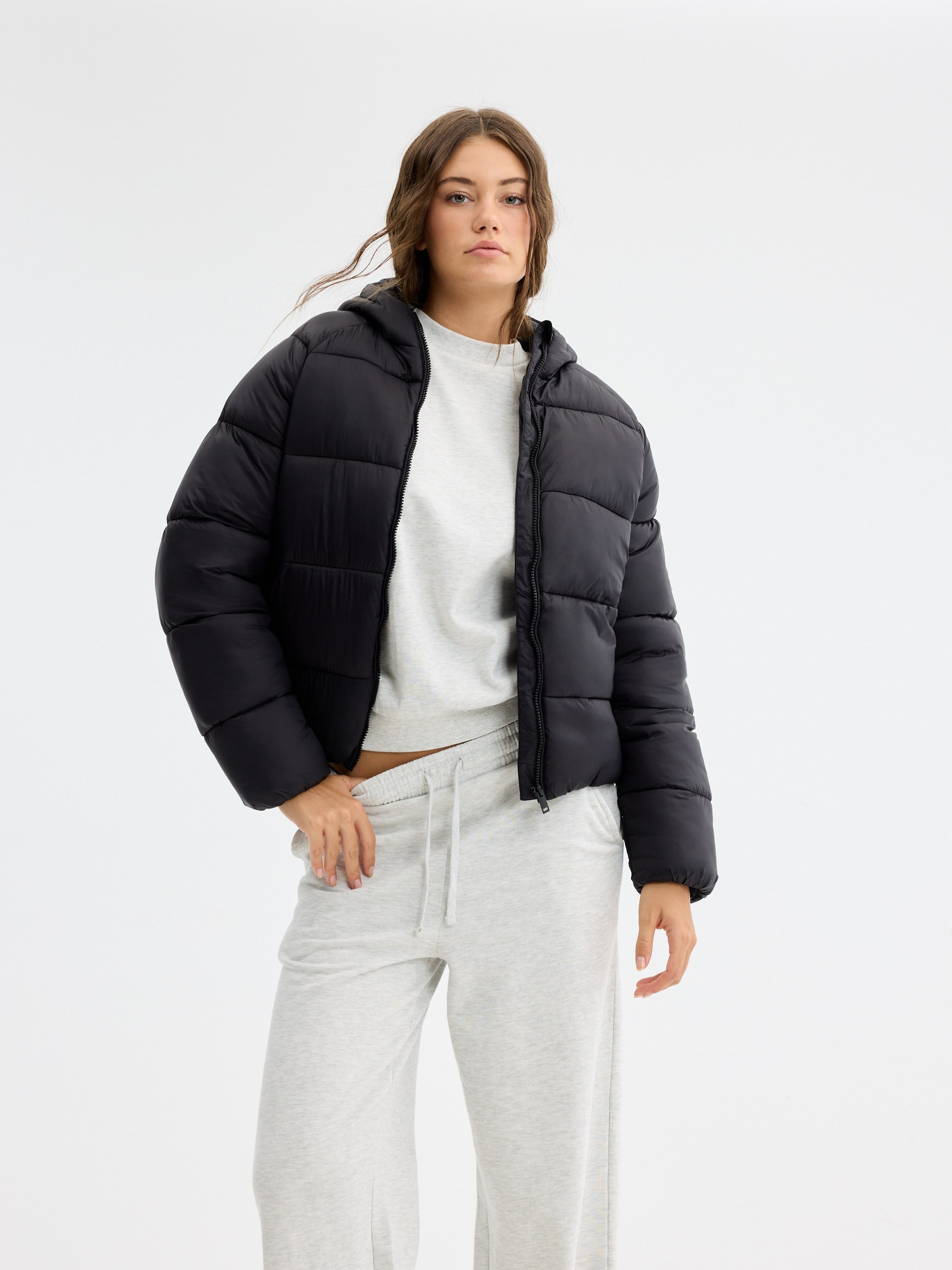 Quilted nylon hooded jacket black middle front view