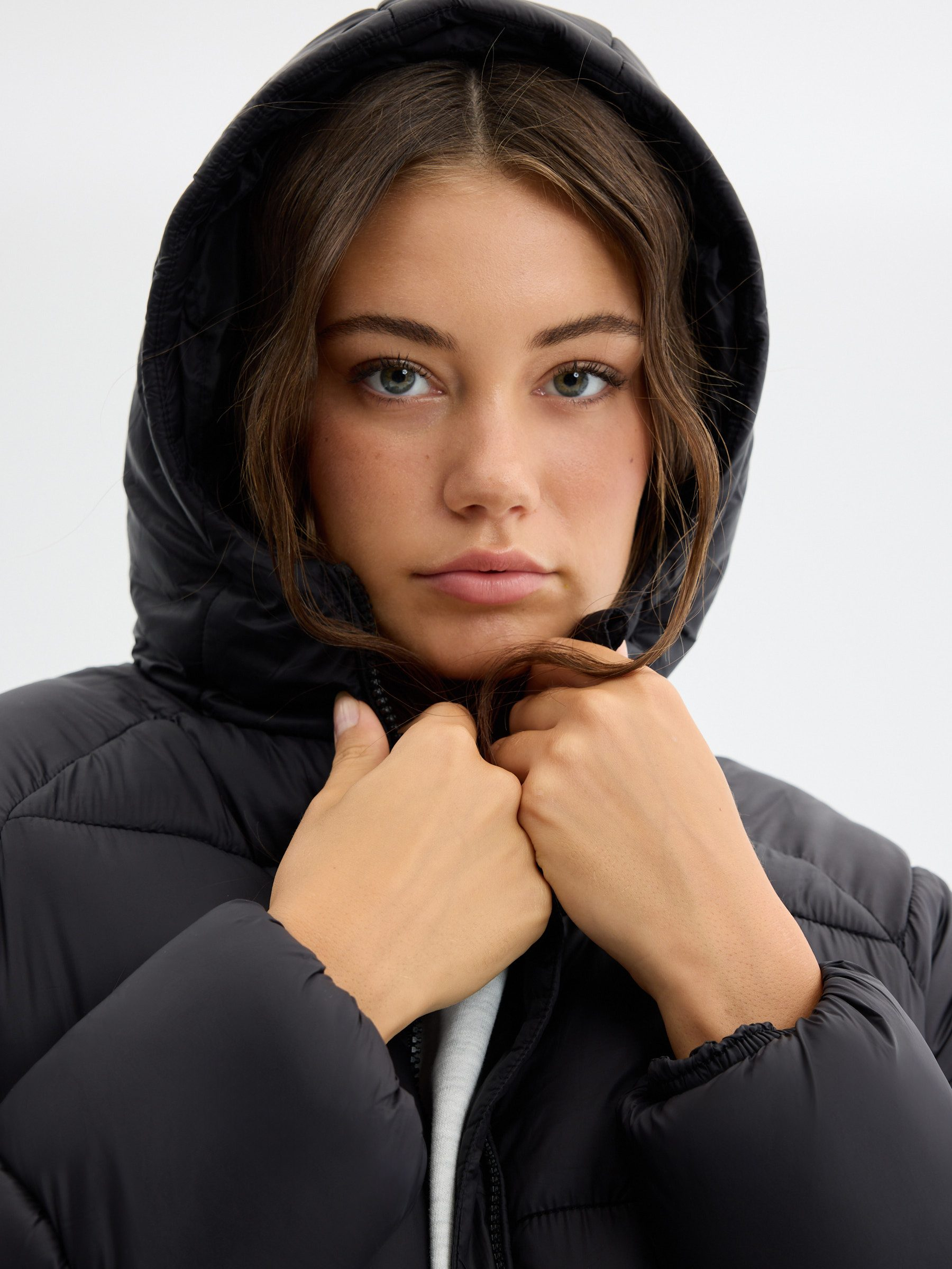 Quilted nylon hooded jacket black middle front view