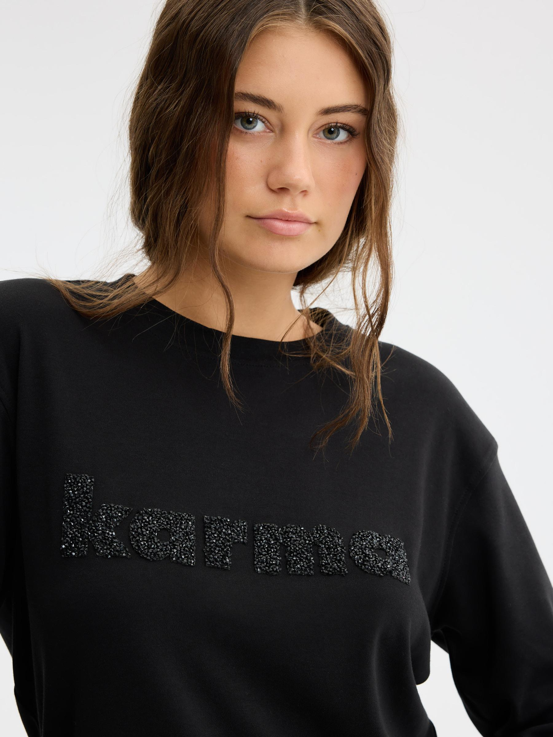 Camiseta manga larga print karma negro vista media frontal
