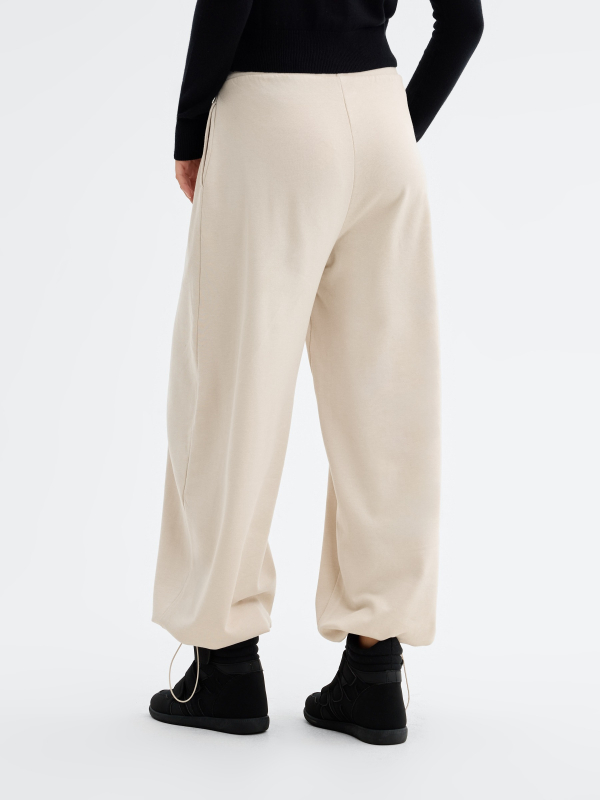 Barrel stoppers fleece pants raw middle back view