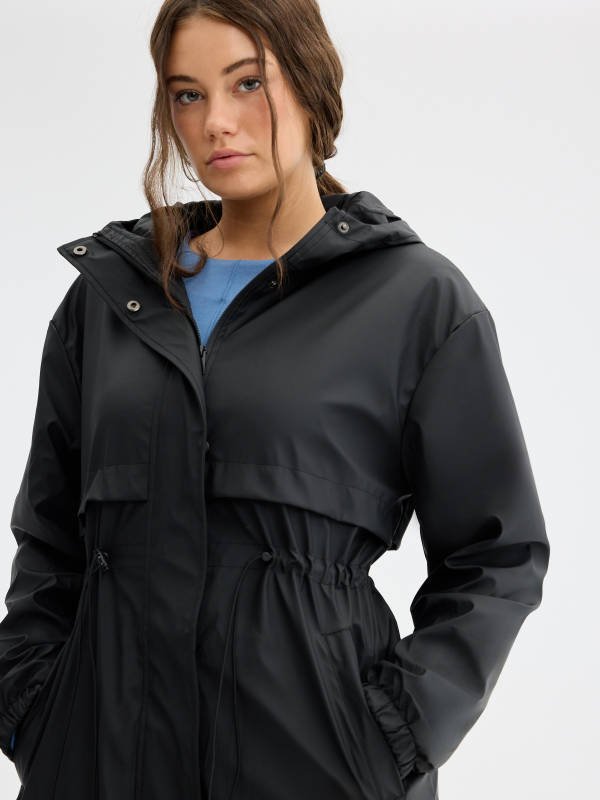 Rubberized parka with hood black detail view