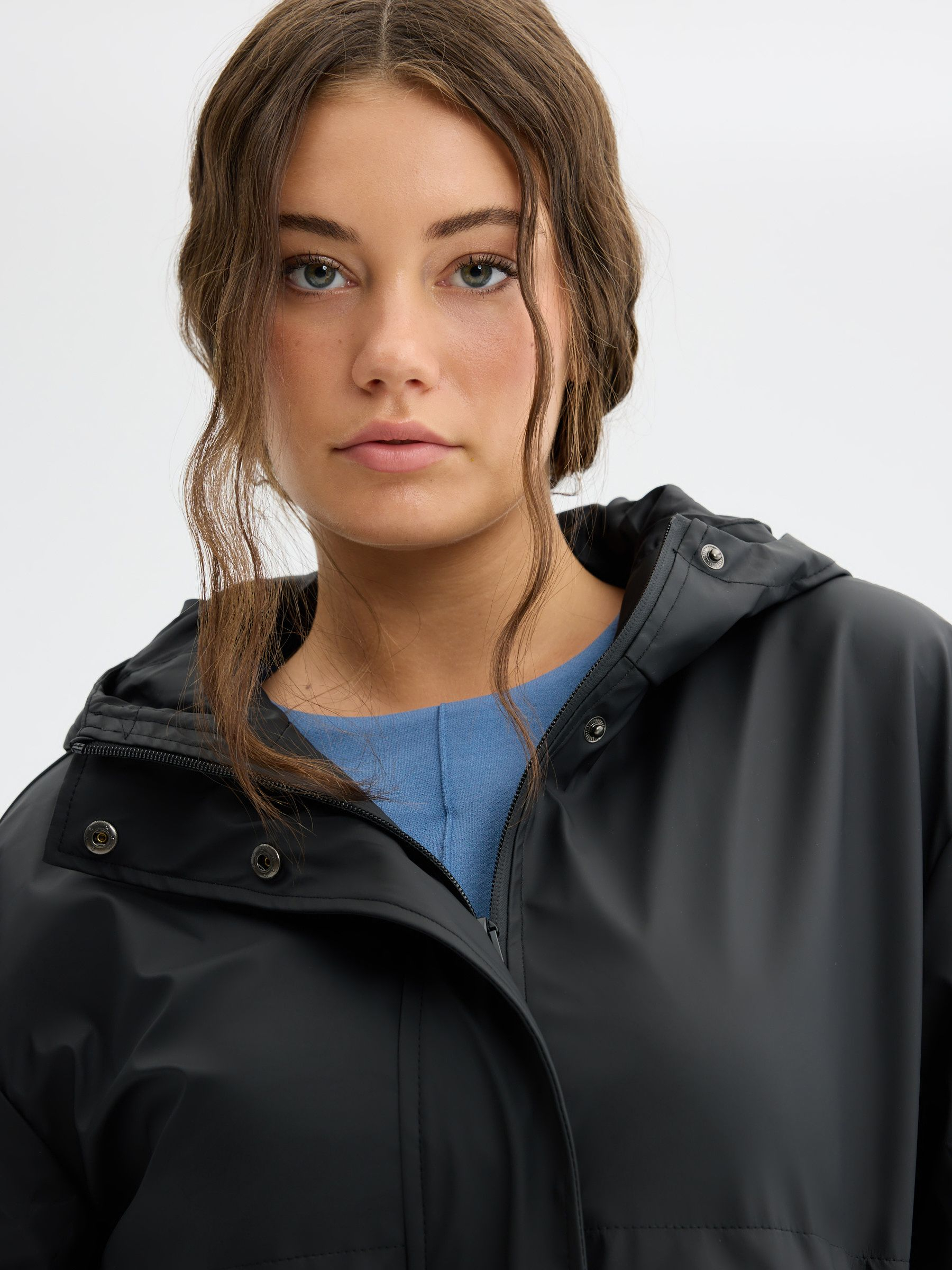 Rubberized parka with hood black middle front view