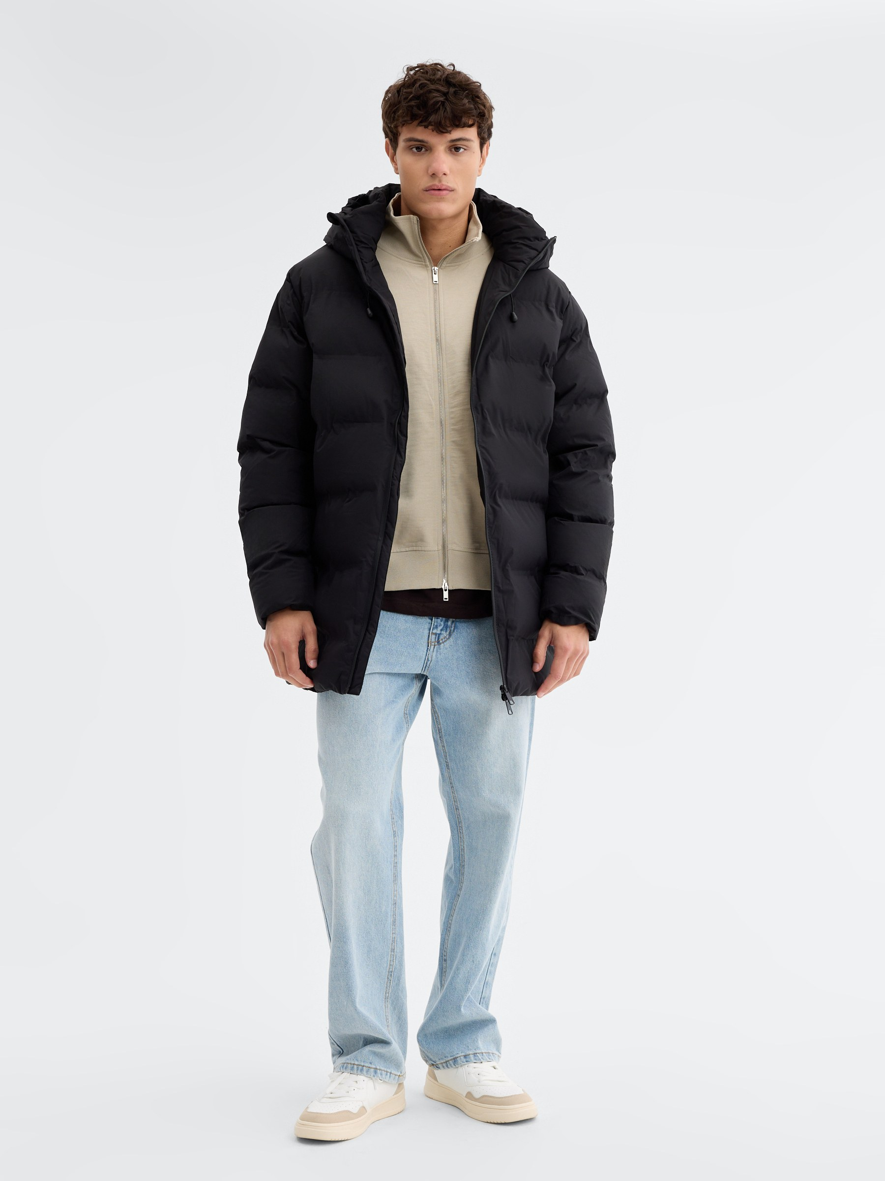 Quilted nylon hooded jacket black middle front view