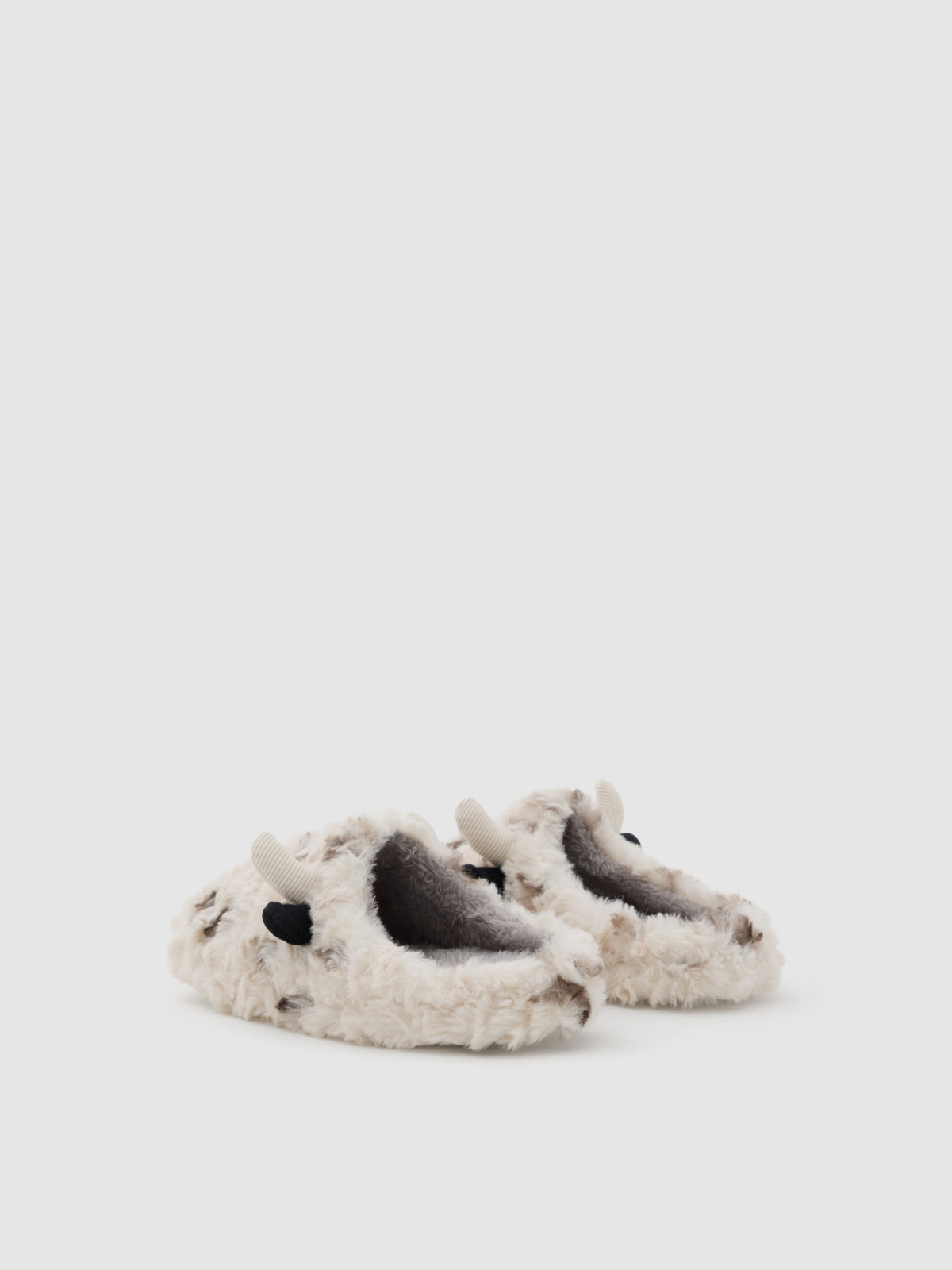 Cow-print furry sneakers off white middle back view