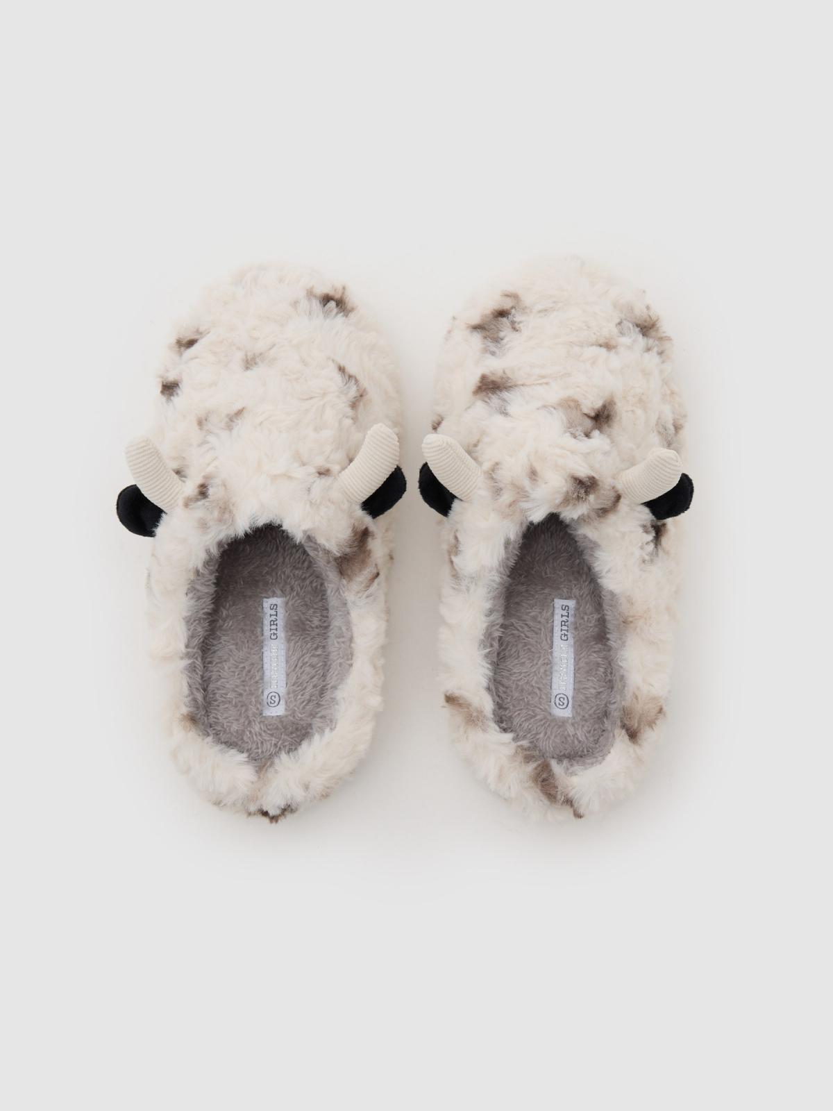 Cow-print furry sneakers off white detail view