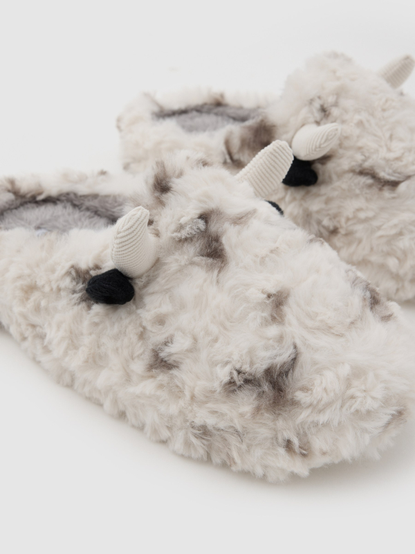 Cow-print furry sneakers off white detail view