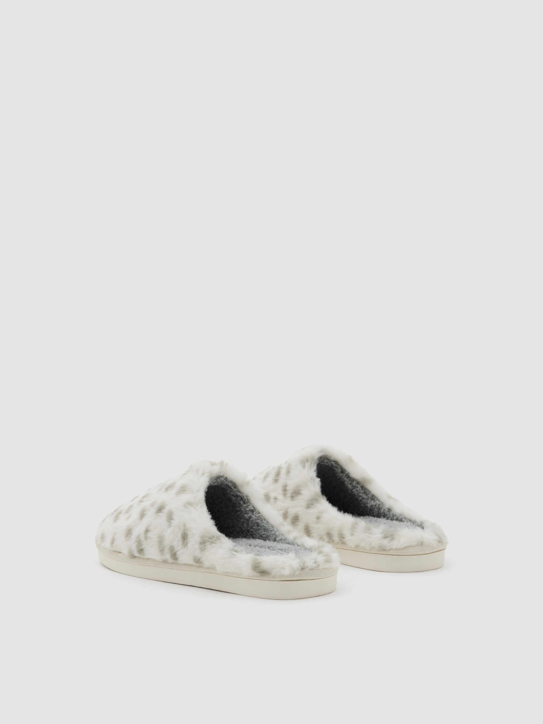 Backless animal print sneakers grey front view