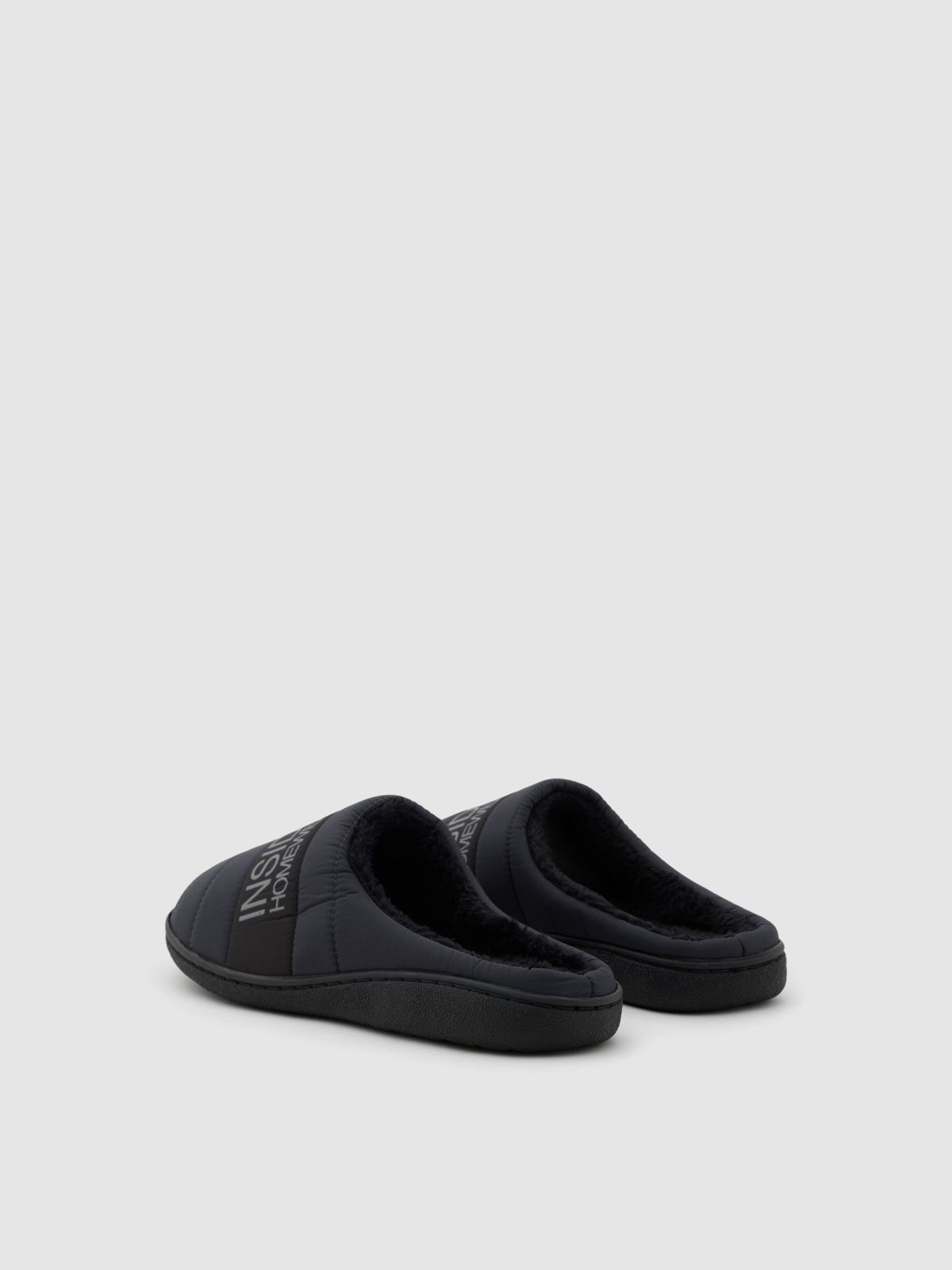 Backless slipper with fur lining black middle back view