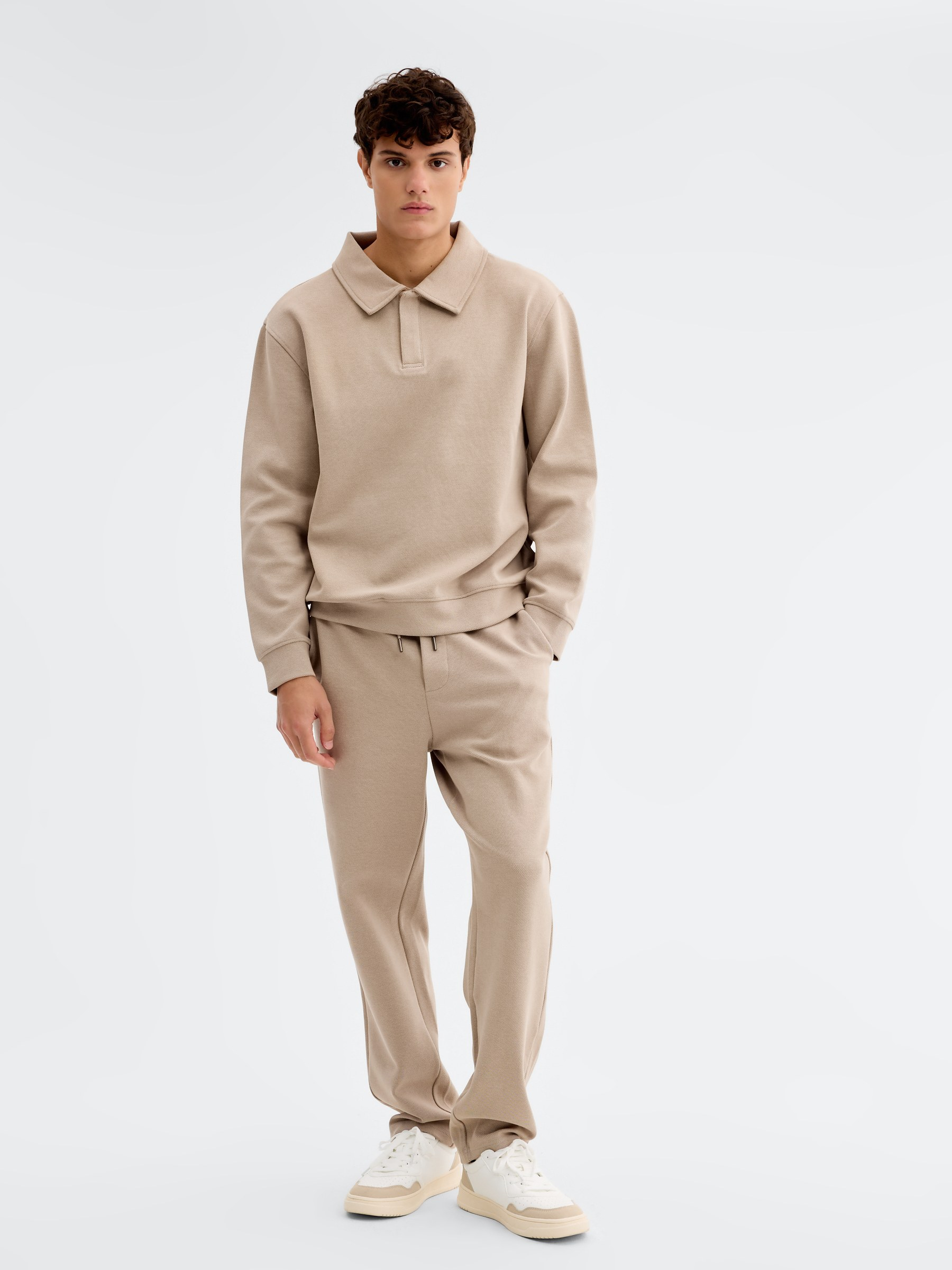 Oversized polo sweatshirt with buttons beige middle front view
