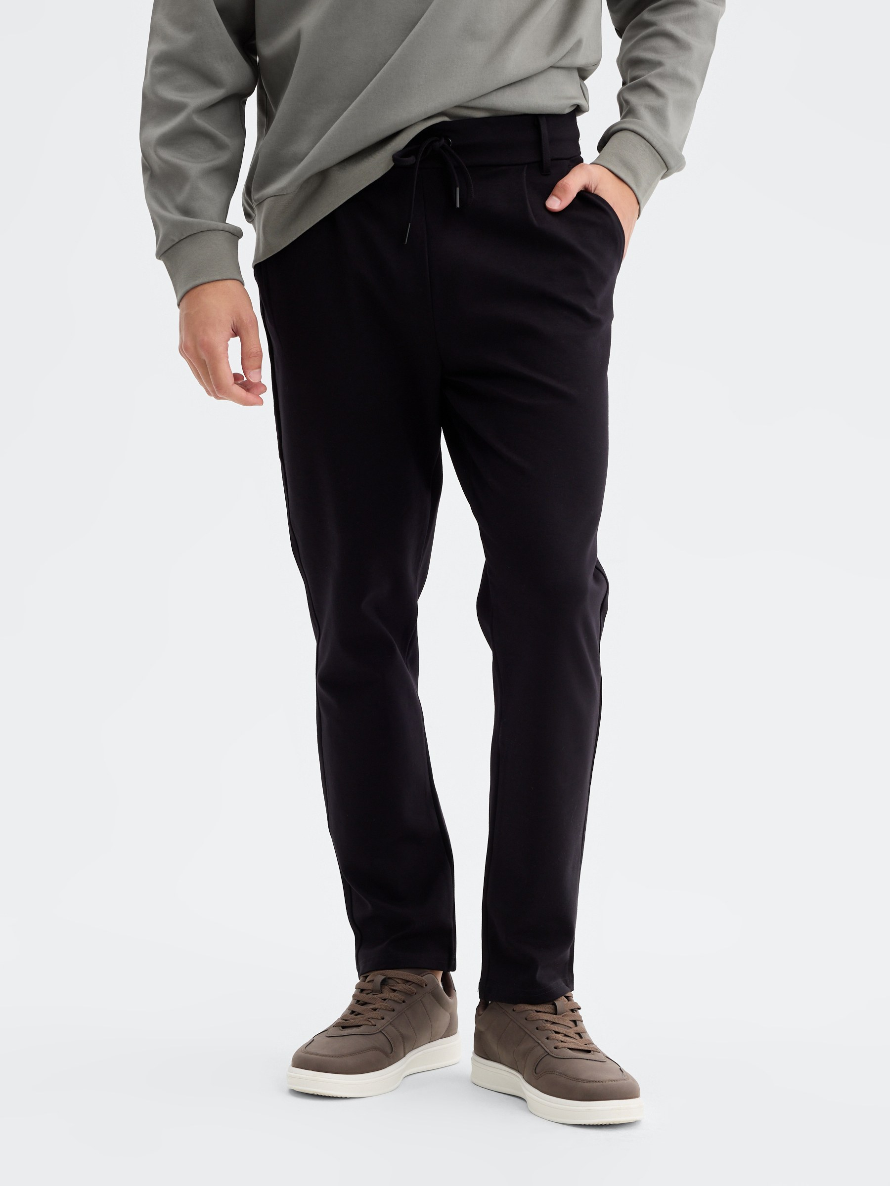 Technical slim-fit chinos black front view