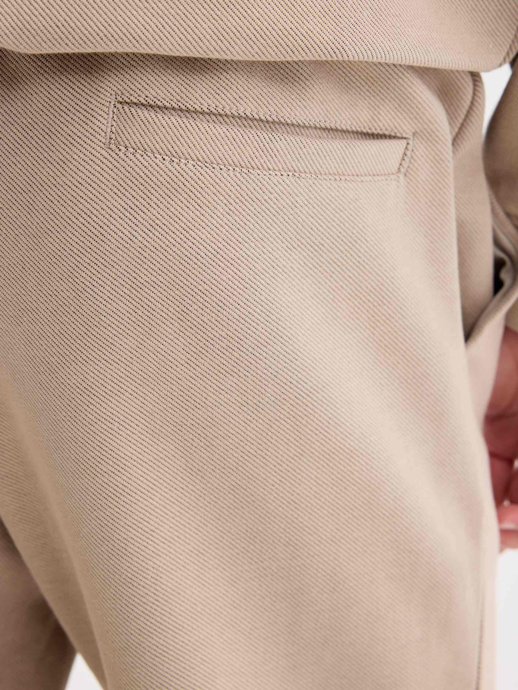 Pantalón jogger tiro alto algodón beige vista general frontal