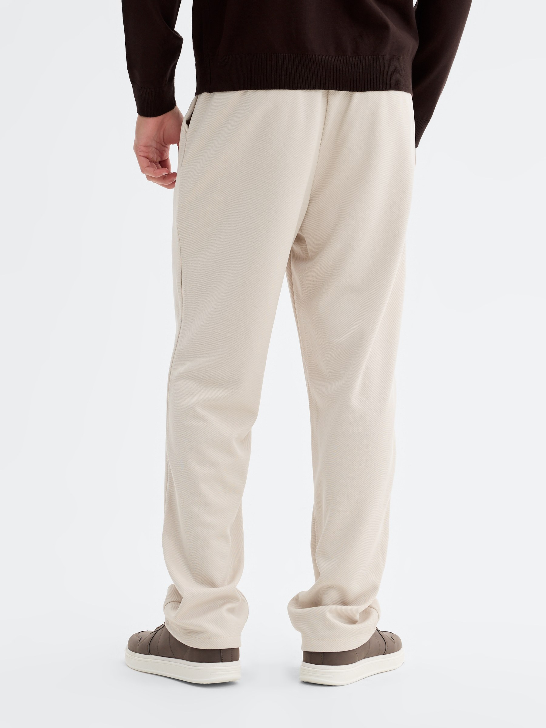 High-waisted polyester chino pants raw front view