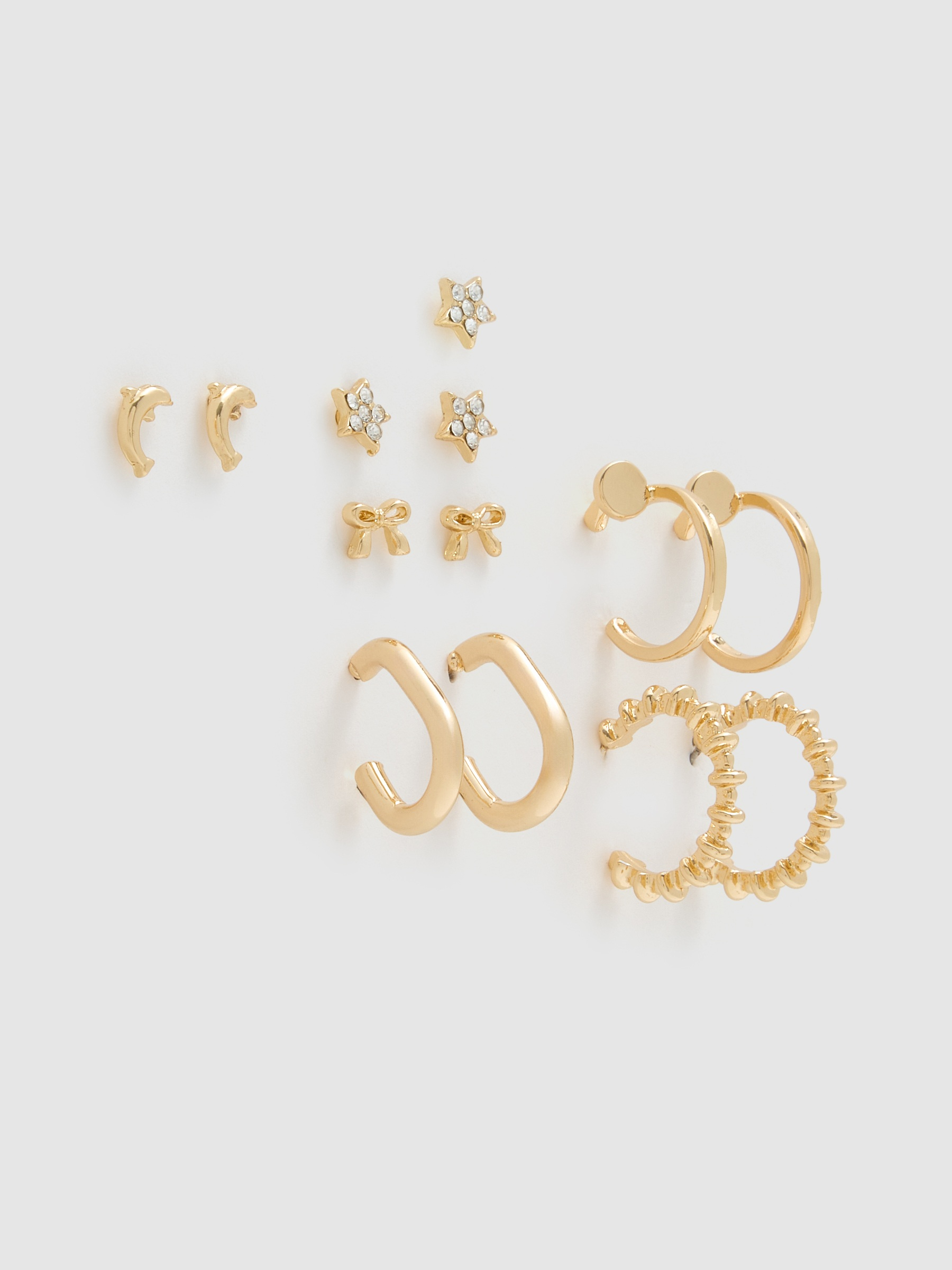 Conjunto de brincos dourados dourado