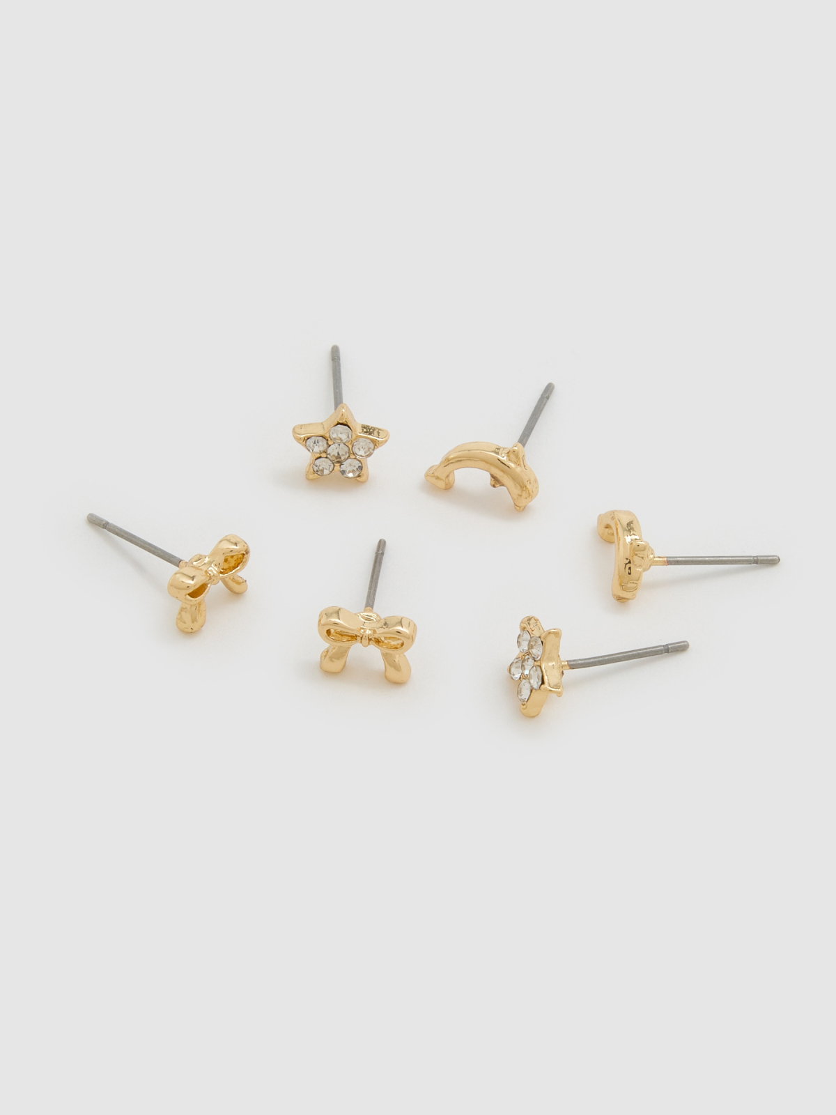 Set of gold earrings golden detail view